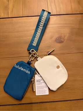 lululemon blue and cream dual pouch wristlet with gold hardware